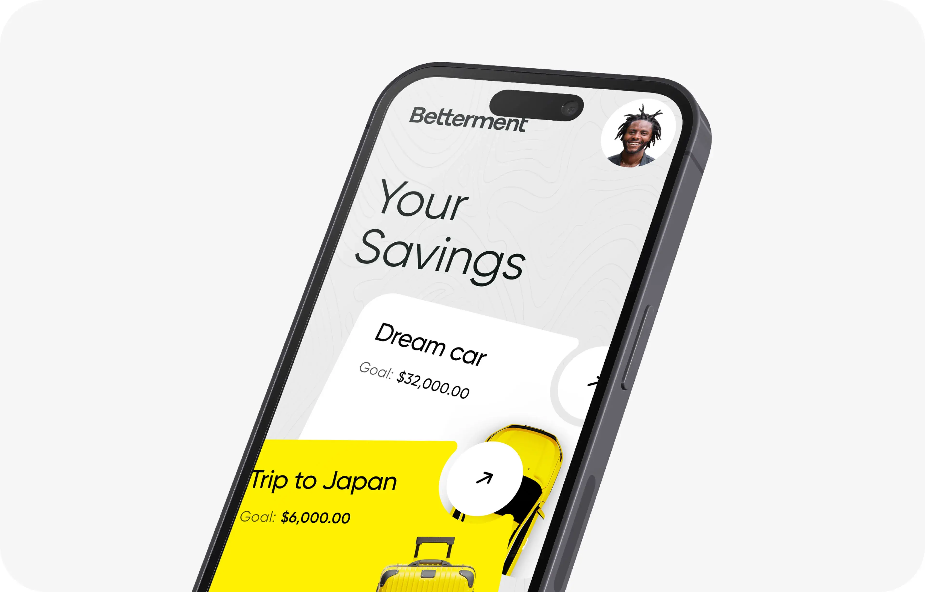 Betterment finance app UI screenshot on iPhone, showing savings goals like Dream car and Trip to Japan. Betterment finance app UI screenshot on iPhone, showing savings goals like Dream car and Trip to Japan.