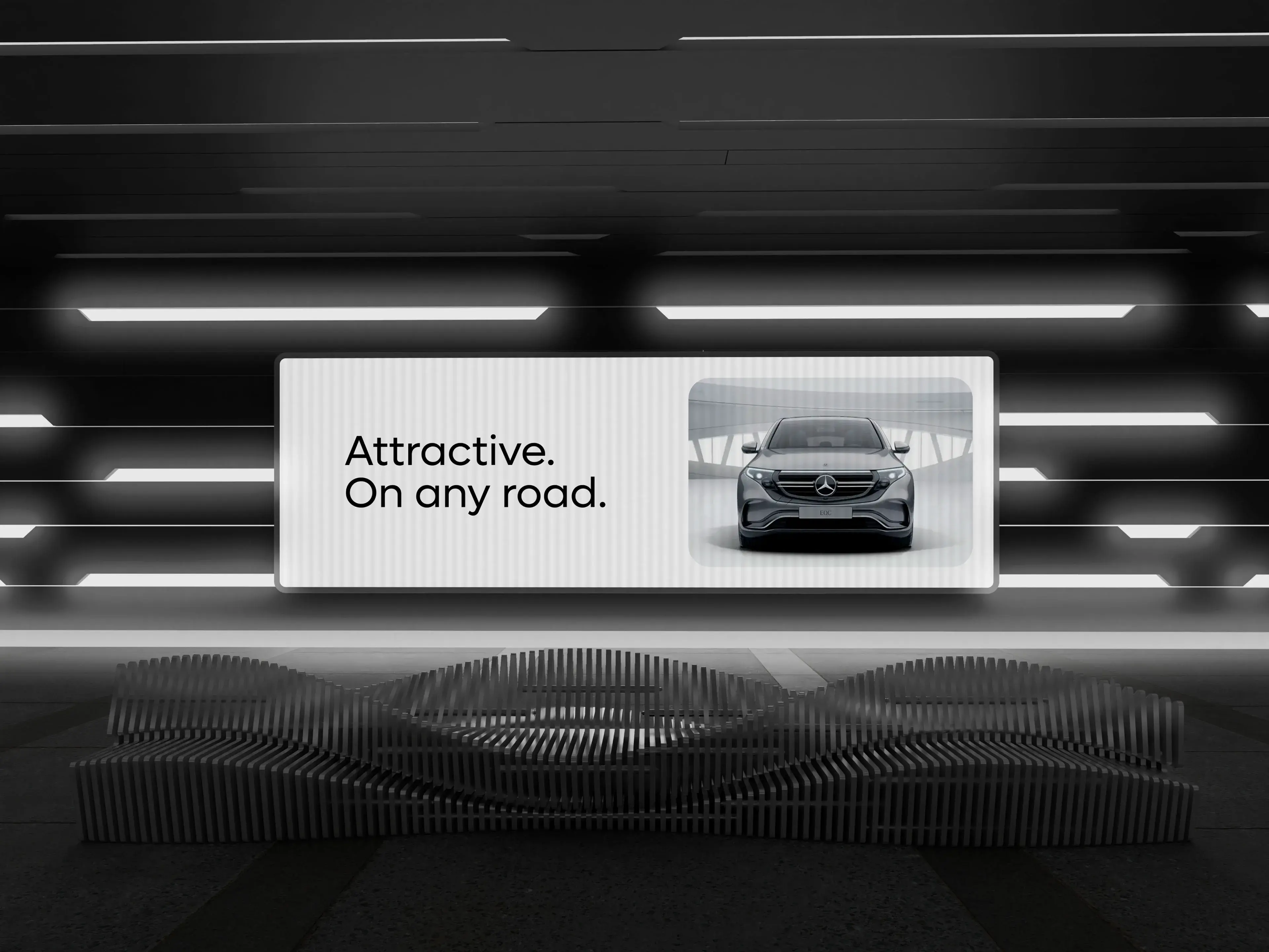 Mercedes-Benz EQC vehicle with marketing text "Attractive. On any road.". Mercedes-Benz EQC vehicle with marketing text "Attractive. On any road.".