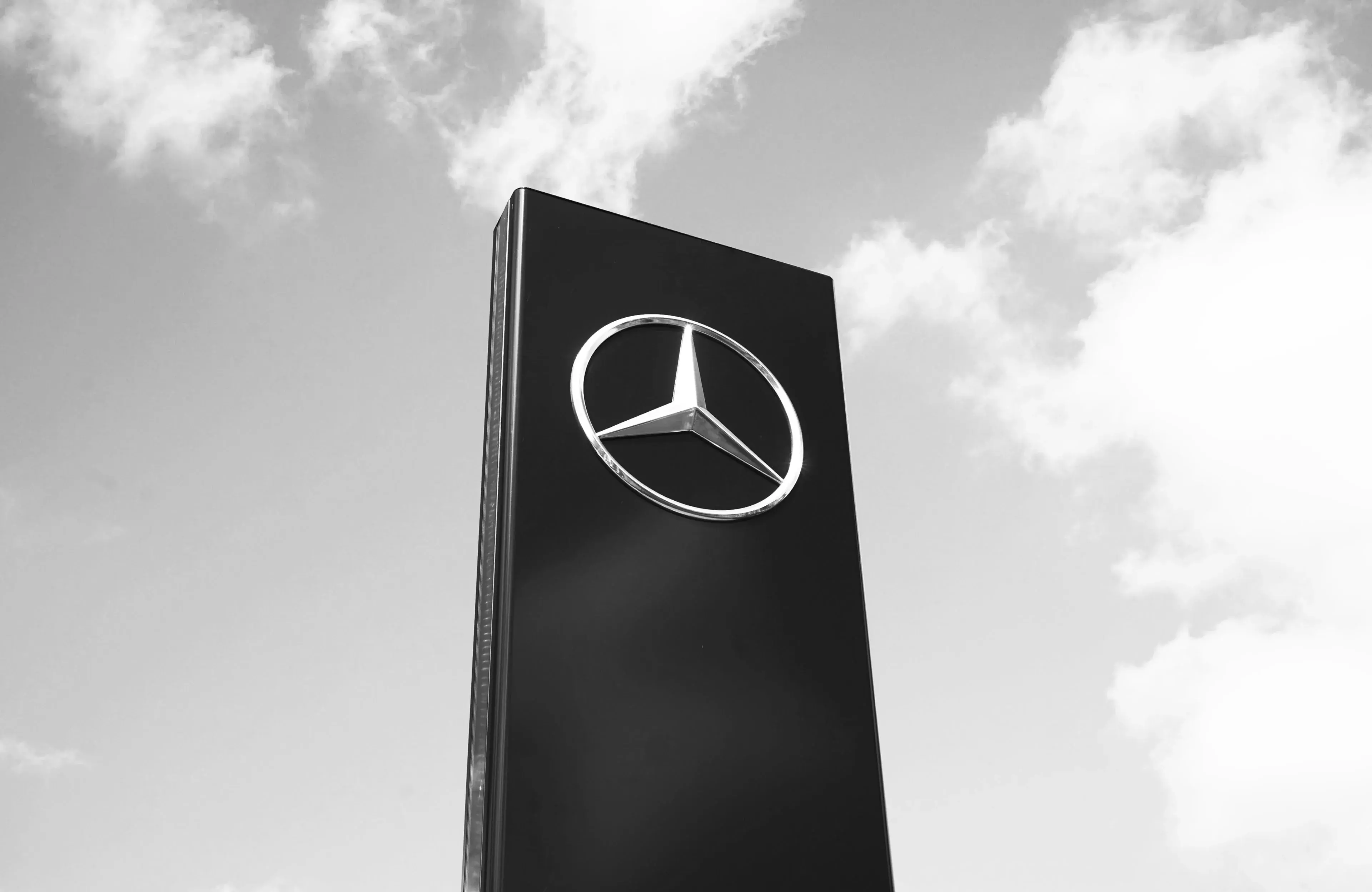 Mercedes-Benz GLC front view focusing on the grille and logo. Mercedes-Benz GLC front view focusing on the grille and logo.