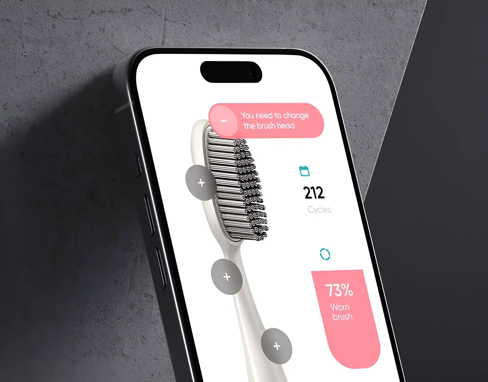 Mobile app UI showing brush head status: 73% Worn, suggesting a change.