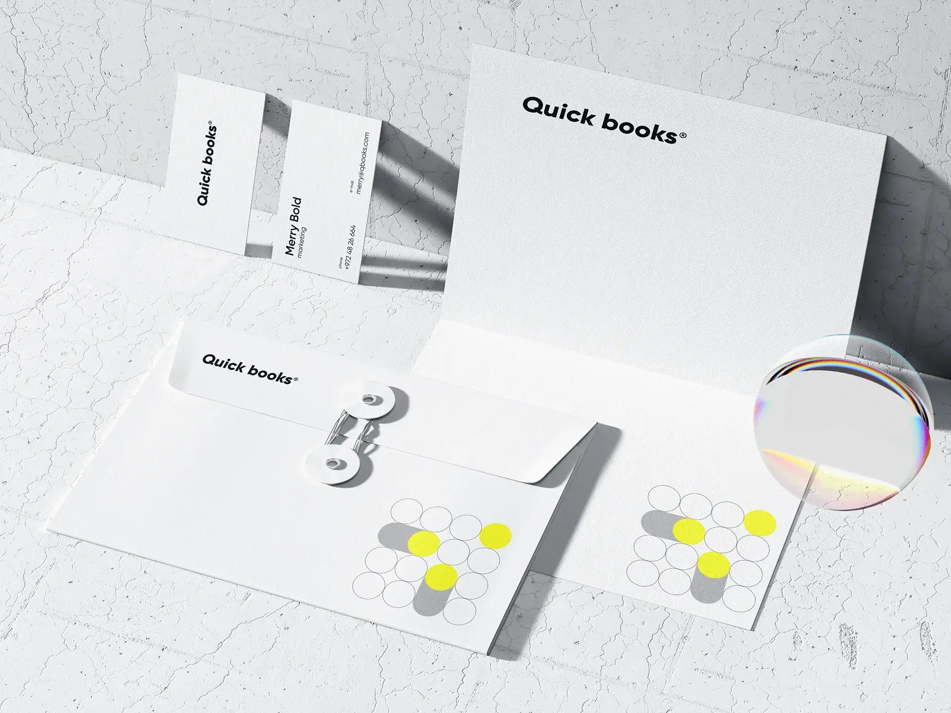 Branding mockup of a Quickbooks business card, demonstrating graphic design for the CRM case study.