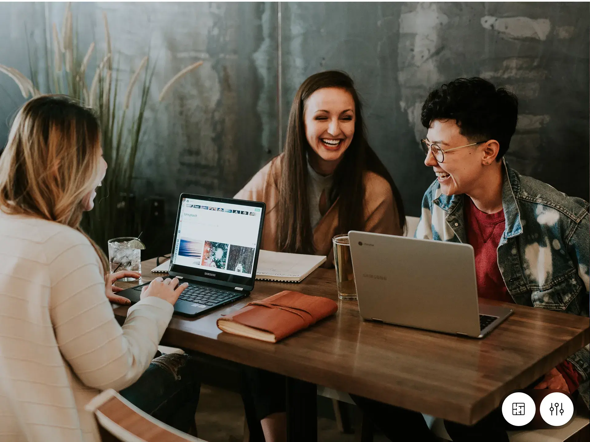 Three people working with a laptop, suggesting mentorship or learning about the finance app. Three people working with a laptop, suggesting mentorship or learning about the finance app.