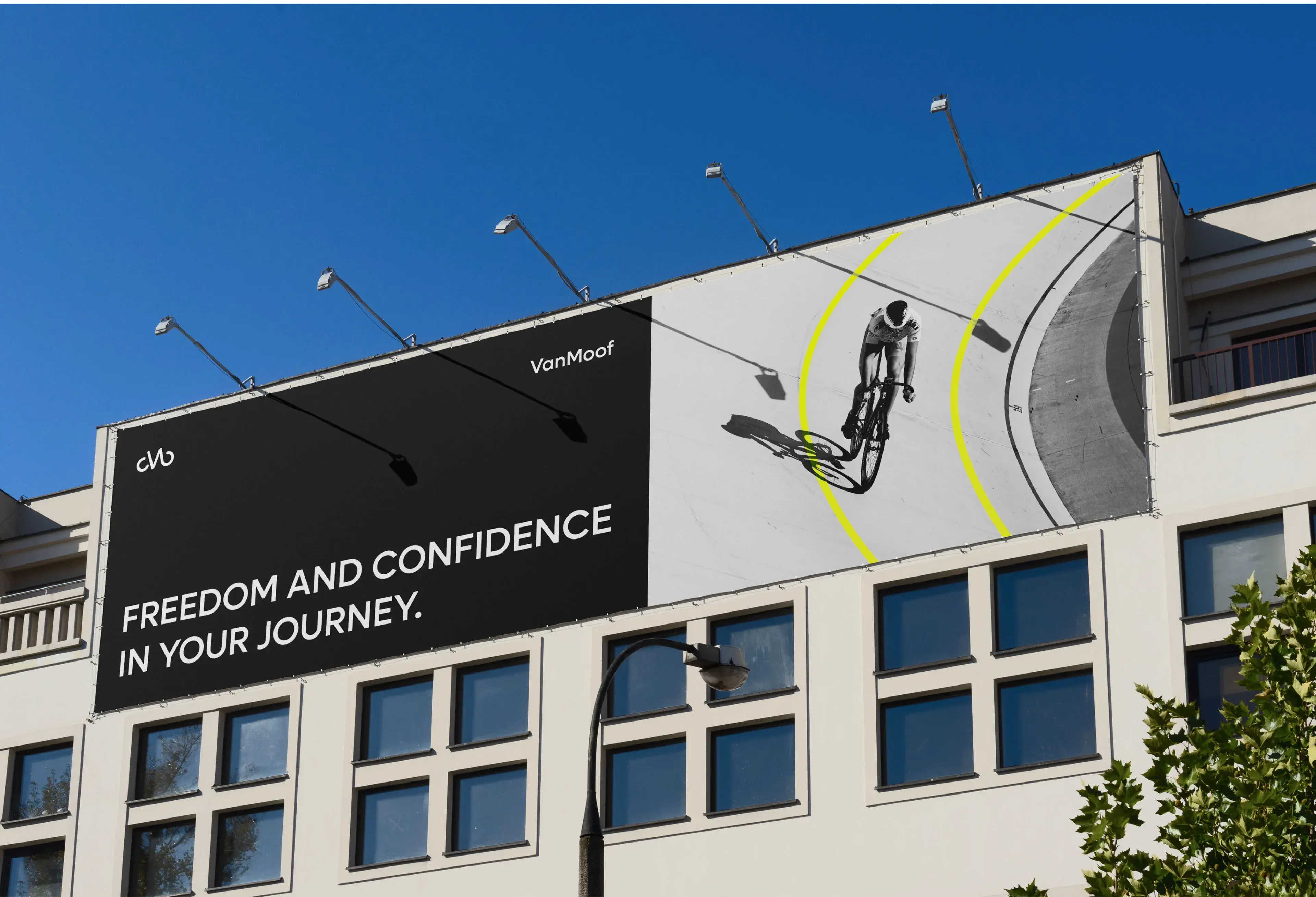 Billboard mockup showing VanMoof branding and the slogan "Freedom and confidence in your journey". Billboard mockup showing VanMoof branding and the slogan "Freedom and confidence in your journey".