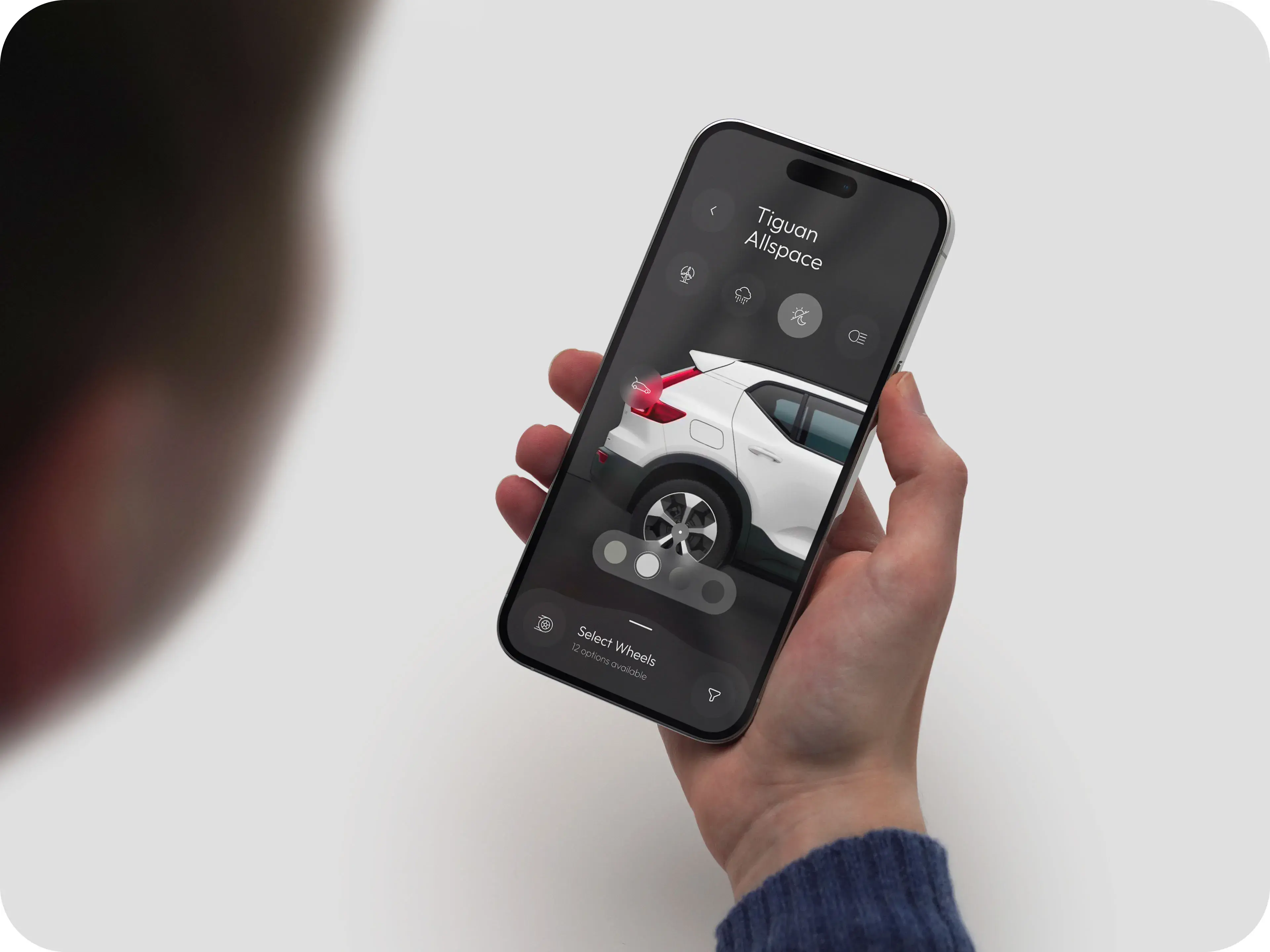 Screenshot of Volkswagen Tiguan Allspace configurator mobile app, showing wheel selection. Screenshot of Volkswagen Tiguan Allspace configurator mobile app, showing wheel selection.